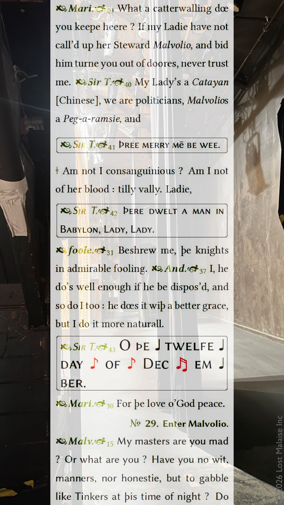 Shakespeare *Twelfth Night* text featuring Olivia, Malvolio, and Feste discussing the fool’s license to speak truth freely, overlaid on a dim backstage Cumston Hall corridor with stage rigging and curtains.