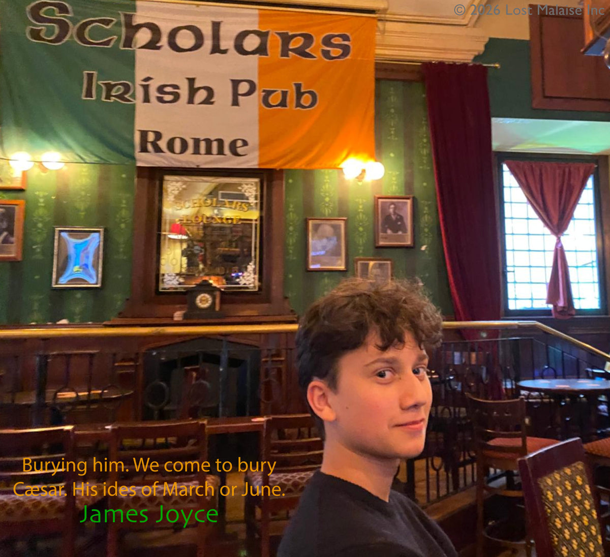Portrait of Anton seated inside Scholars Irish Pub in Rome beneath a large Irish flag, paired with a James Joyce quotation referencing Caesar and the “ides of March,” evoking the political intrigue of Shakespeare’s Julius Caesar.